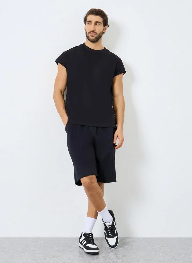 ستايلي اكتيف تيشيرت رياضي بدون أكمام بطبعة كتابة